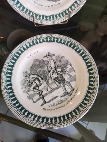 12 assiettes en faïence de Sarguemine sujet Sport