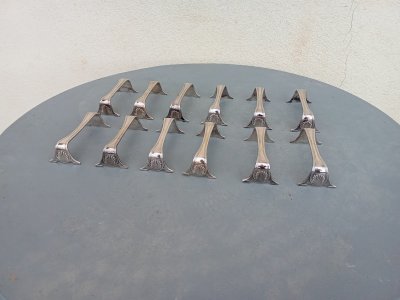12 silver-plated knife holders