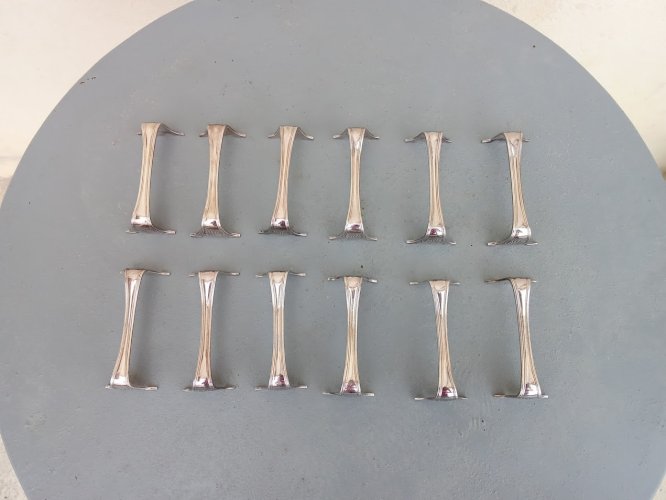 12 porte-couteaux en métal argenté