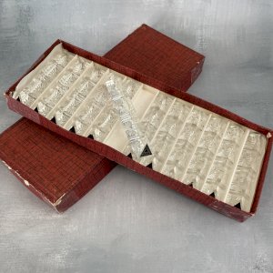 12 crystal knife rests in 24% lead, triangular flower base.