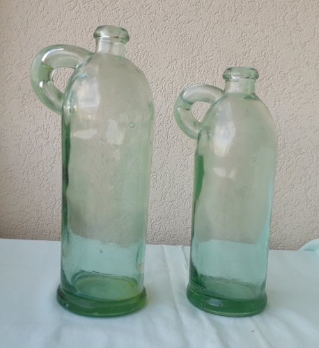 2 Bouteilles en verre
