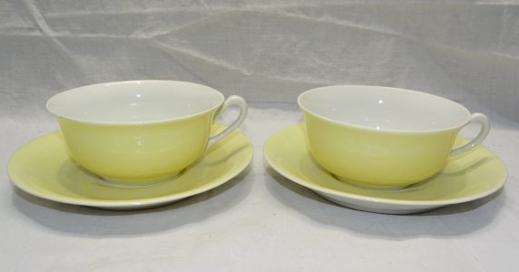 - 2 CUPS and SAUCERS PORCELAIN LIMOGES PALE YELLOW and WHITE D