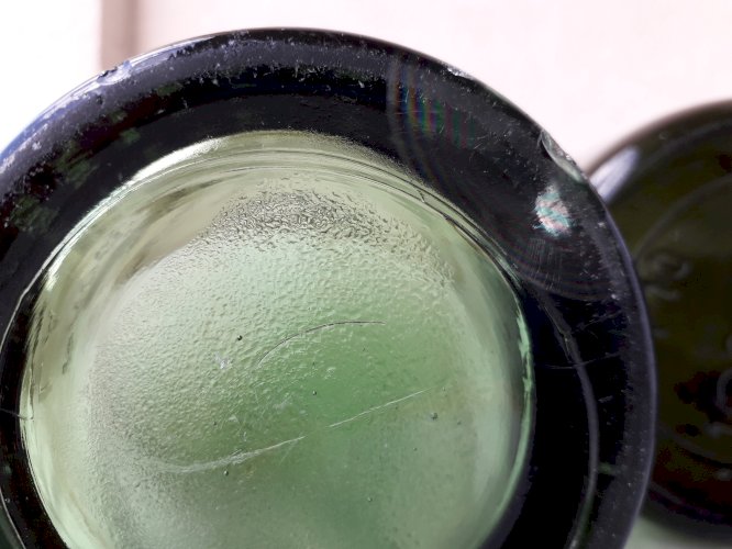 3 bouteilles en verre