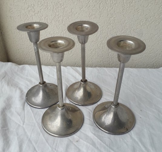 4 bougeoirs en métal