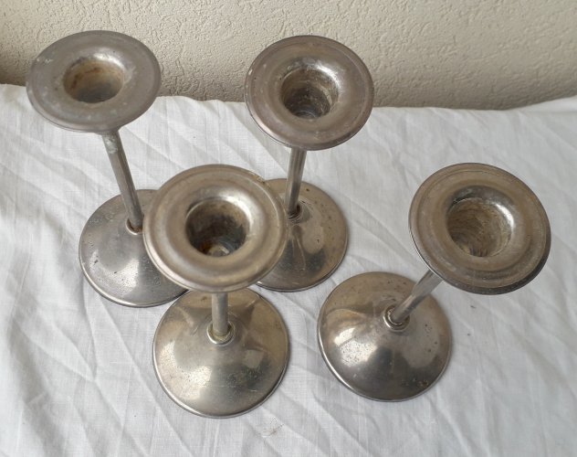 4 bougeoirs en métal