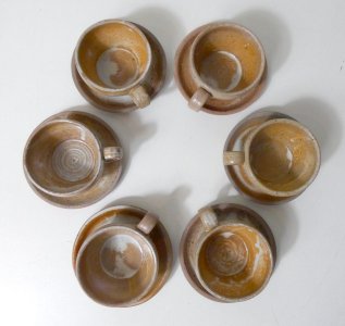 6 vintage stoneware cups with saucers