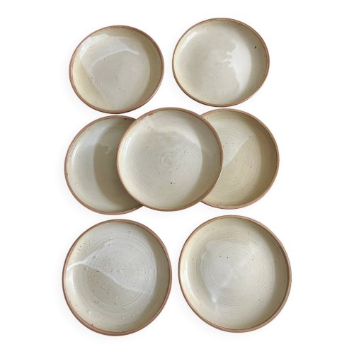 7 assiettes en grés 1970
