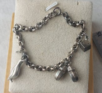 Vintage charm bracelet, made of silver.