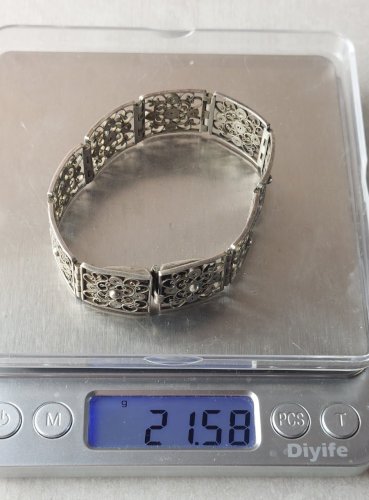 Ancien bracelet décor filigrane, en argent ^