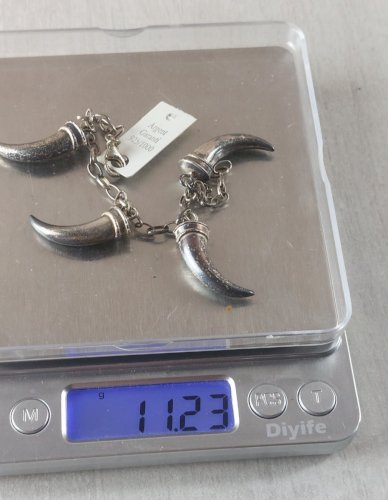 Ancien bracelet, décor griffes, en argent massif