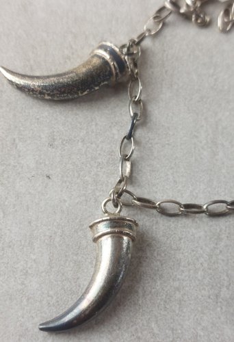 Ancien bracelet, décor griffes, en argent massif