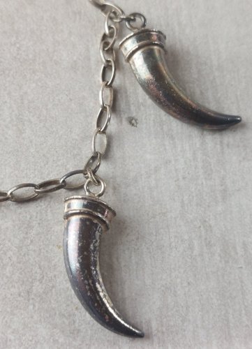 Ancien bracelet, décor griffes, en argent massif
