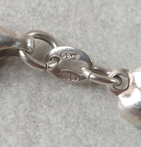 Ancien bracelet, décor poissons, en argent massif