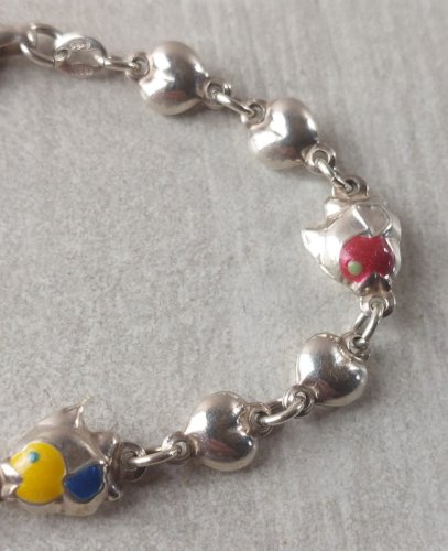 Ancien bracelet, décor poissons, en argent massif