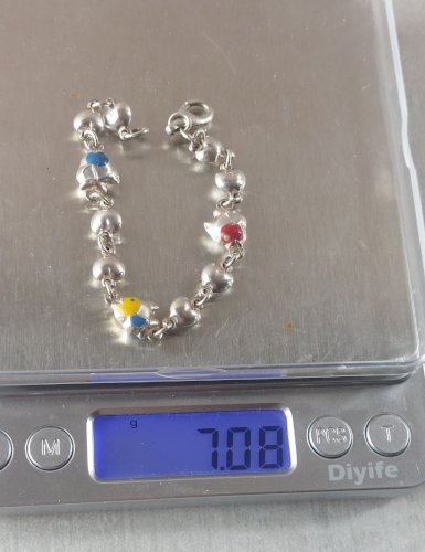 Ancien bracelet, décor poissons, en argent massif