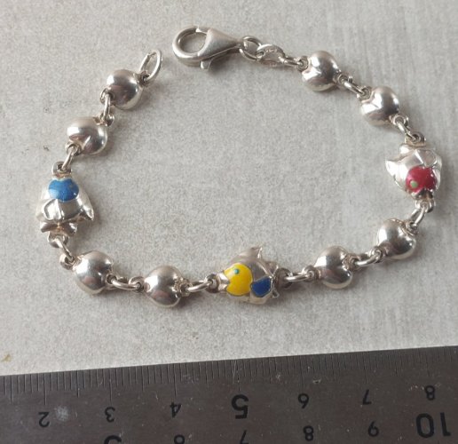 Ancien bracelet, décor poissons, en argent massif
