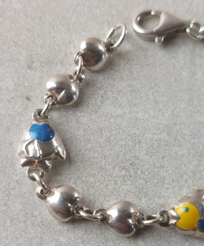 Ancien bracelet, décor poissons, en argent massif