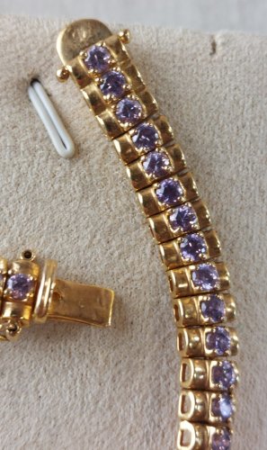 Ancien bracelet décor strass mauve, en métal doré