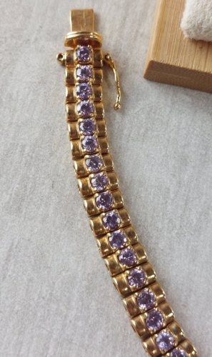 Ancien bracelet décor strass mauve, en métal doré