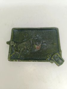 old ashtray pocket with hunting scene decor in good condition