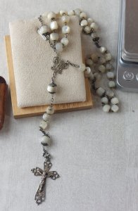 Old rosary made of mother-of-pearl and silver