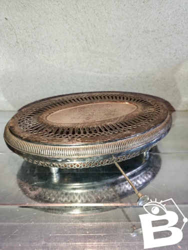 ancien chauffe plat a deux bougies en metal argente en bon etat