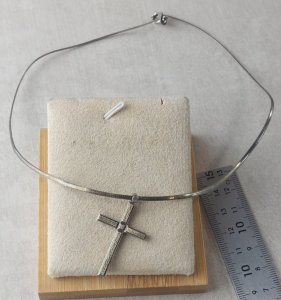 Ancient necklace with a religious cross pendant, made of solid silver.