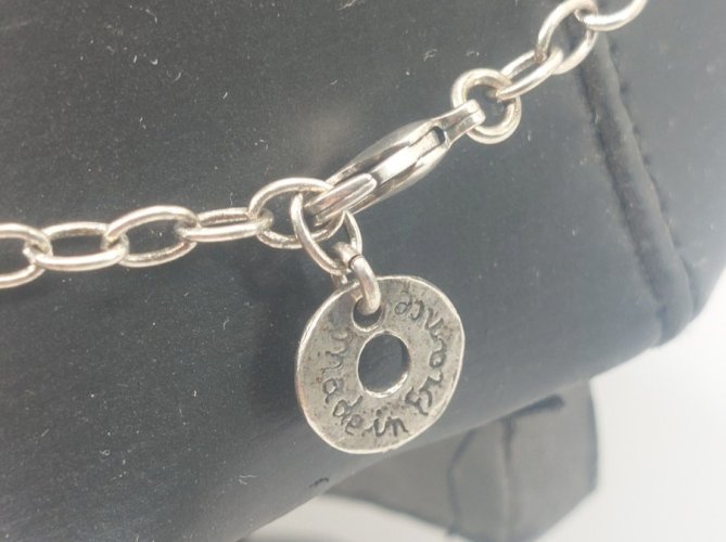 Ancien collier, en métal argenté, Lili la pie ^