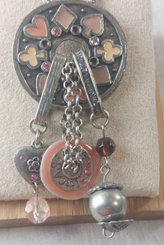 Ancien collier, en métal argenté, T.Street
