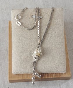 Old neglected necklace, pearl decoration, in 835 silver