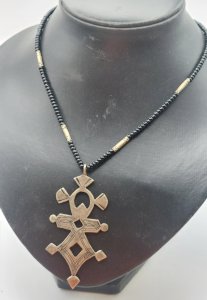 Vintage Tuareg / ethnic necklace, made of silver metal / silver and black beads.