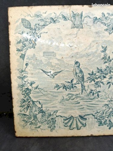 Ancien dessous de table en ceramique a decor doiseaux et floral en etat dusage