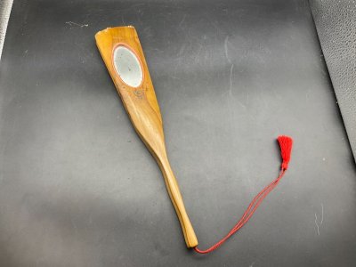 Antique fan with a handle made of olive wood and decorated with a swallow and mirror.