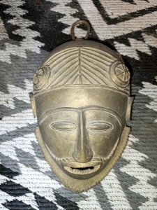 ancient large African bronze mask in good condition