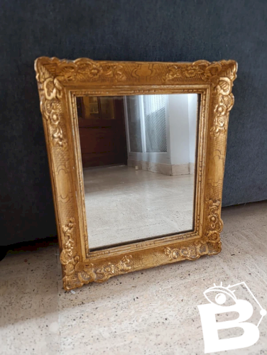 ancien miroir en bois sculpte en bon etat