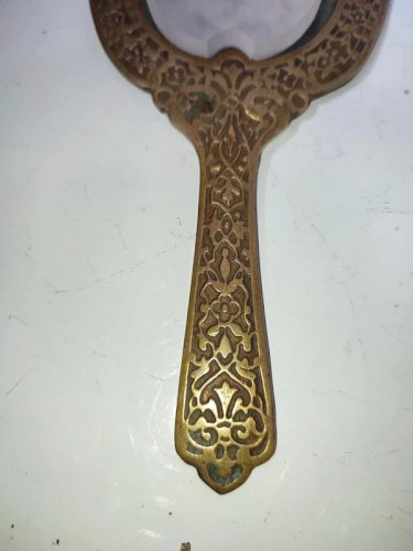 ancien miroir en bronze ou laiton avec verre biseautée en bon etat
