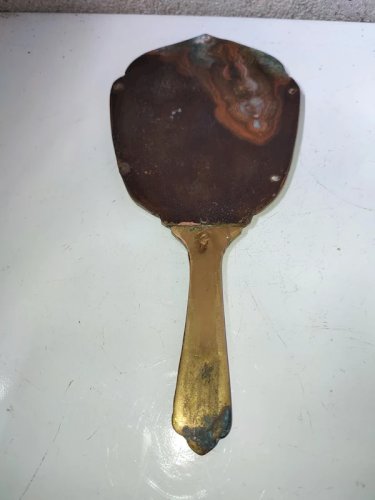 ancien miroir en bronze ou laiton avec verre biseautée en bon etat