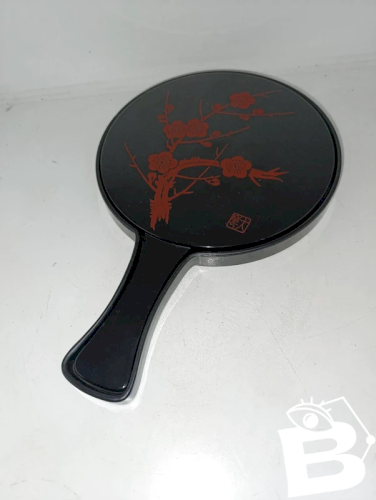 ancien miroir japonais a deux faces à decor floral en etat correct