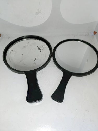 ancien miroir japonais a deux faces à decor floral en etat correct