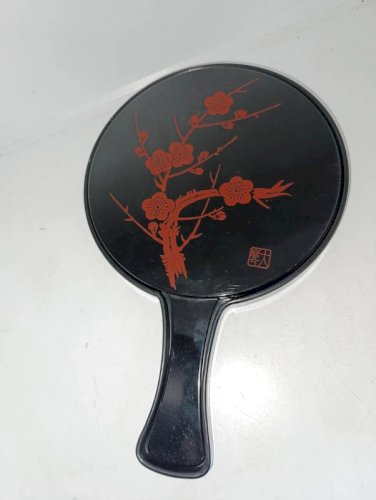 ancien miroir japonais a deux faces à decor floral en etat correct