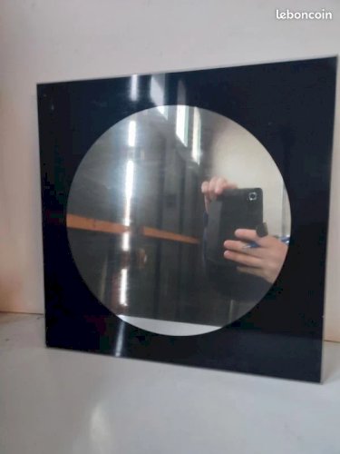 Ancien miroir vintage contour noir en bon etat