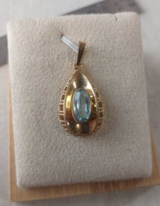 Ancien pendentif, en plaqué or et pierre bleue, art déco ^