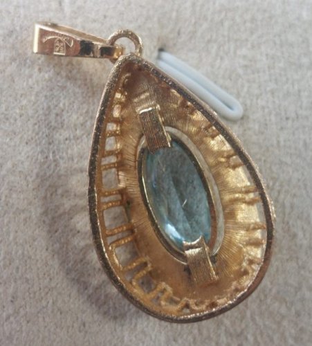 Ancien pendentif, en plaqué or et pierre bleue, art déco ^