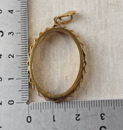 Ancien pendentif / médaillon, porte photo, double face, en métal doré ^