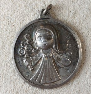 Old religious pendant / medallion, Virgin Mary design, in silver.