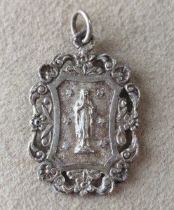Antique religious pendant/medallion, Our Lady of Lourdes, in silver-plated metal.
