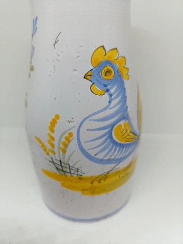 ancien pichet à decor de coq et fleur en bon etat