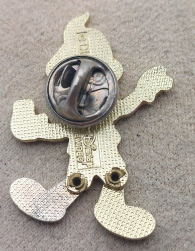Ancien pin's / pins, Pinocchio, jambes articulées, Walt Disney Home Video