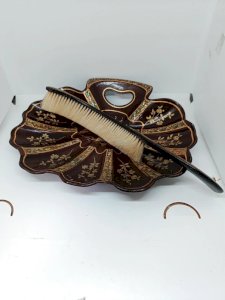 old Asian crumb collector with comb in good condition