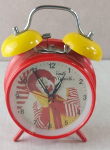 Old mechanical alarm clock, Ronald McDonald, vintage